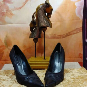 A pair of Nine West High heels Black